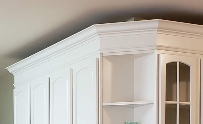 Crown molding and shelf above the doors.and real doors